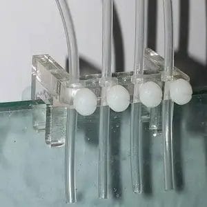 Dosing-pump-tube-holder